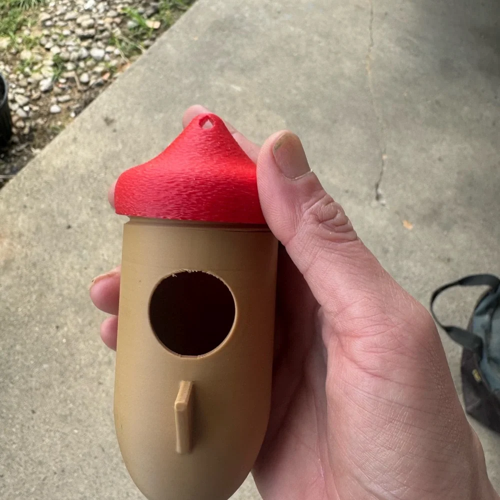 Red and Tan Birdhouse humming bird